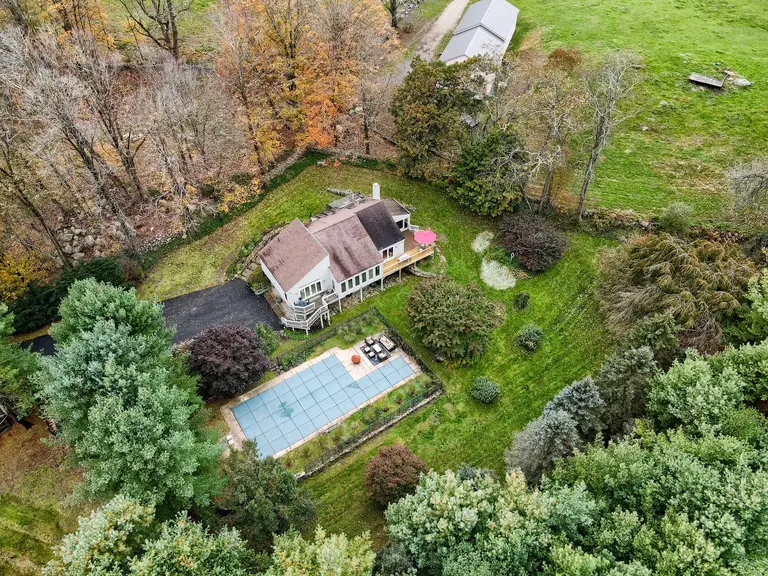 For $899K, this Connecticut country house has a heated barn, a pool, and a winery