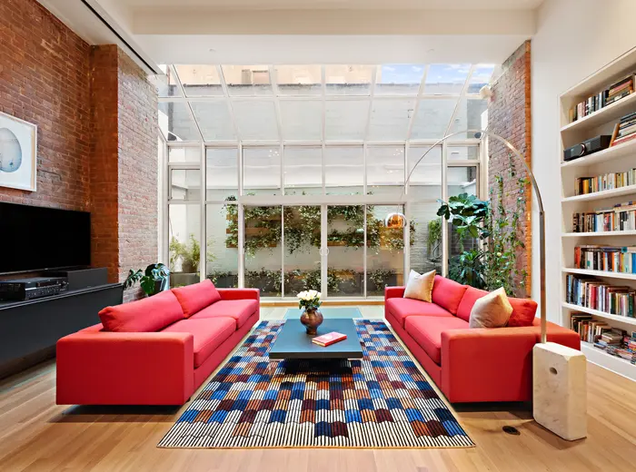 Behind a classic Soho facade, there's nothing raw about this $4.25M loft triplex