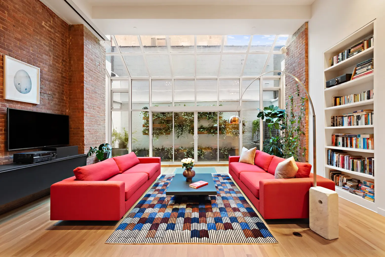 Behind a classic Soho facade, there’s nothing raw about this $4.25M loft triplex