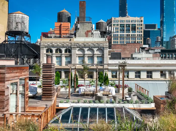 Dine and dance on the private rooftop of this $6.4M Flatiron penthouse loft
