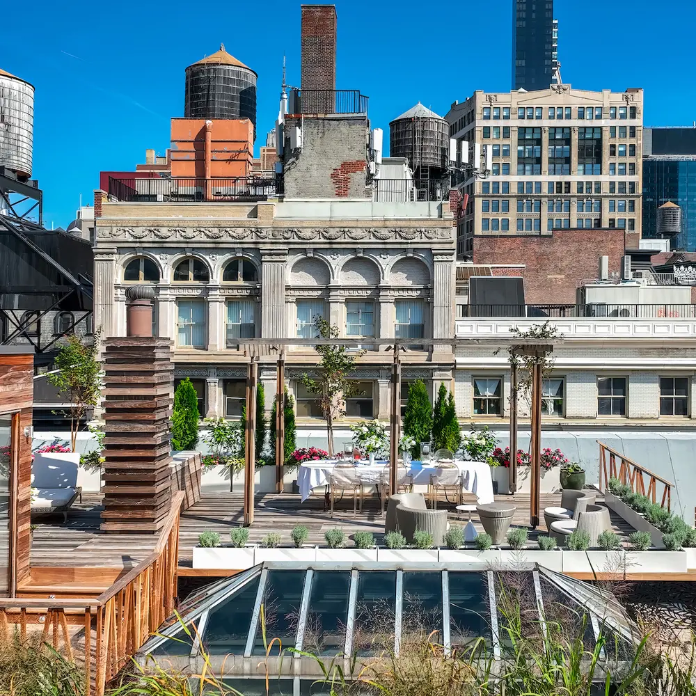Dine and dance on the private rooftop of this $6.4M Flatiron penthouse loft