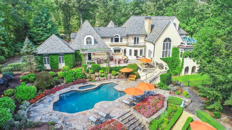 Asking $1.7M, this Tuscan-style Connecticut villa has a 500-bottle wine grotto and a ‘Western lodge’