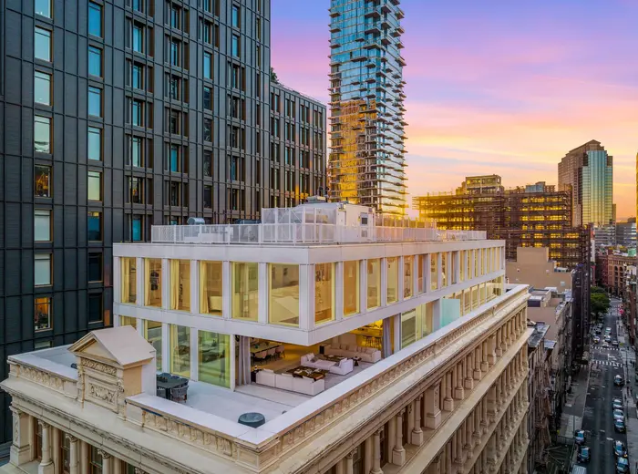Designed by Shigeru Ban, this $12M Tribeca penthouse glows atop a historic neighborhood landmark